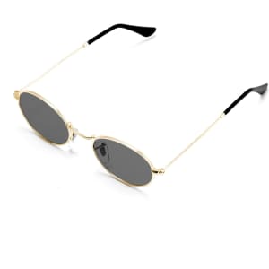 Oval retro sunglasses with a gold frame and dark lenses, featuring black ear tips.