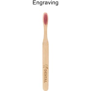 A bamboo toothbrush with a large flat handle and pink bristles, featuring a logo on the handle.