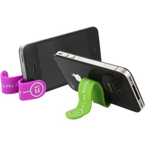 A green and purple silicone magnetic clip designed to hold phones upright, featuring a branding logo.