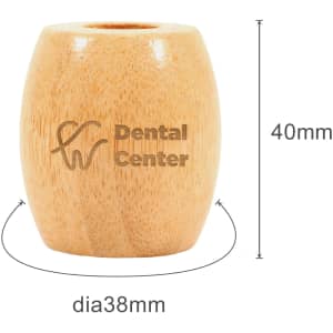 A bamboo toothbrush stand with a natural finish, featuring a logo, measuring 40mm tall and 38mm in diameter.