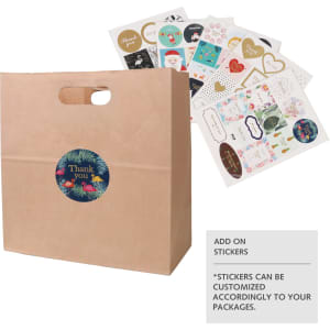 A brown kraft paper bag with a handle, featuring a circular logo and assorted decorative stickers beside it.