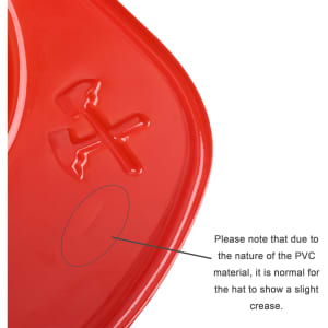 A red PVC fire chief hat with a slight crease visible on the surface. It has a logo on the side.