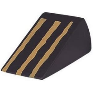 A wedge-shaped black stress reliever with three gold stripes running along the top.