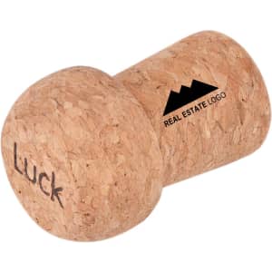 A champagne cork-shaped flash drive in natural cork colour with a logo and the word "Luck" engraved.