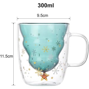 A double wall mug designed in the shape of a Christmas tree, featuring a translucent teal interior and gold accents.