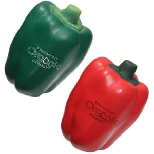 Two stress relievers shaped like a green and a red capsicum, featuring a logo on one.