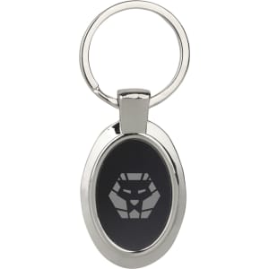 A silver keyring with an oval shape and a black panel featuring a logo design.