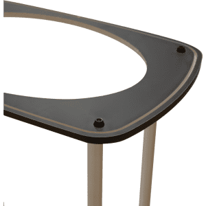 A black tabletop with a curved edge, supported by silver legs, featuring inset screws. It has a logo displayed.