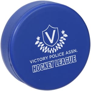 A blue hockey puck-shaped stress reliever with a logo and text on the surface.