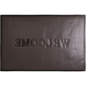 A rectangular brown floor mat with a debossed welcome logo and a smooth surface.