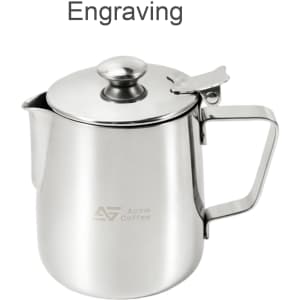 A stainless steel milk frothing pitcher with a lid, featuring a handle and a branded logo.
