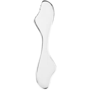 A silver massage tool with a curved design, featuring a textured side for enhanced grip.