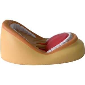A mouth-shaped stress reliever in brown and pink, featuring white teeth and a red tongue. It has a logo on the side.