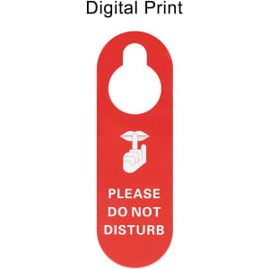 A red PVC door hanger featuring a “Please Do Not Disturb” message and a logo.