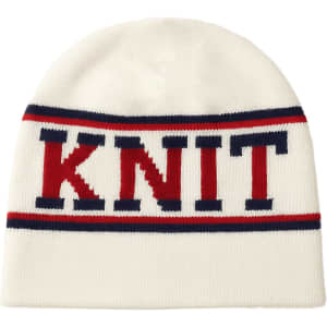 A white Jacquard beanie featuring red and navy blue stripes with a knit design. It has a logo.