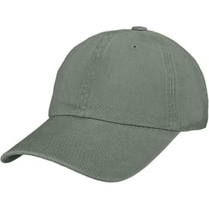 A premium washed cotton baseball cap in a muted green colour with a curved brim and a simple logo.
