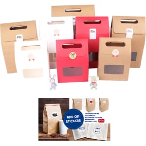 A variety of die cut handle bags in red, white, and brown, featuring windows and handle openings, with some branding.