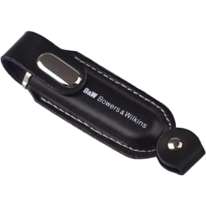 A black leather flash drive holder with a metallic accent and a logo.