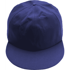 A giant navy baseball cap with a solid design and a curved brim. It features a logo on the side.