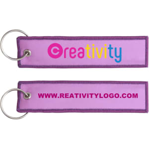 A purple woven key tag with a metal ring, featuring a logo and website on both sides.