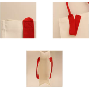 A horizontal canvas tote bag in cream with red handles and a logo. Multiple angles highlight its design.