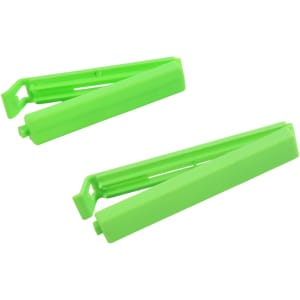 Two bright green medium food bag seal clips positioned side by side, featuring a simple design and a small logo.
