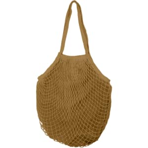 A mesh grocery bag in a tan colour with inner lining and two shoulder straps.