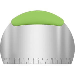 A flour cutter with a stainless steel blade and a green ergonomic handle, featuring measurement markings.