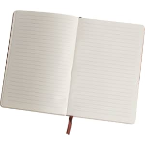 An open A5 notebook featuring natural cork and cotton covers with lined pages. It has a ribbon marker.