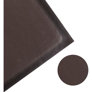 A dark brown debossed mat with a textured surface, featuring a rounded corner in a close-up view.