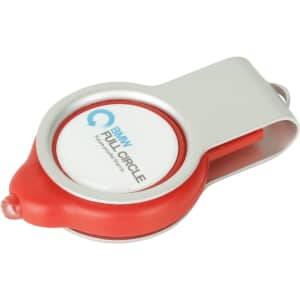 A retractable light-up flash drive with a silver body and red accents, featuring a logo on the front.