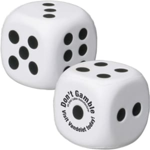 A white dice-shaped stress reliever featuring black dots and a logo on one side.