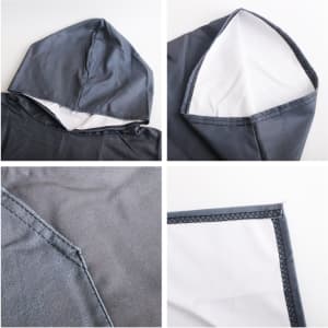 A grey hooded change towel made of 100% microfibre featuring a soft inner lining and stitched seams, with a logo present.