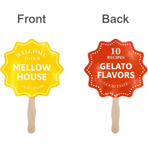 A custom-shaped paper hand fan with a yellow front featuring a starburst design and a red back with a different starburst.