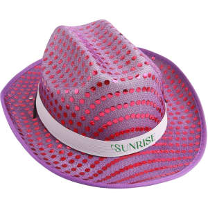 A sequin cowboy hat in shades of pink and purple with a white band, featuring a logo.