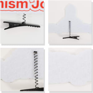 A black felt spring hair clip with a spiral design against a light background. It features a logo in the corner.
