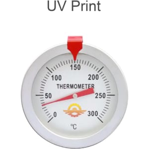 A stainless steel deep fry thermometer with a red indicator and a dial measuring temperatures in Celsius.