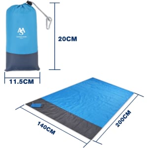 A blue picnic blanket with dimensions shown, packaged in a blue drawstring bag with a logo.