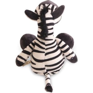 A plush toy zebra featuring black and white stripes with oversized ears and a tufted tail. It has a small logo.