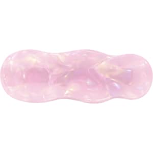 A pink iridescent alligator hair clip with a wavy design and a glossy finish. Contains branding.