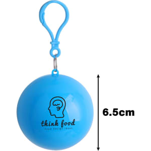 A blue, spherical rain poncho ball with a clip, featuring a logo on its surface. Measures 6.5 cm in diameter.