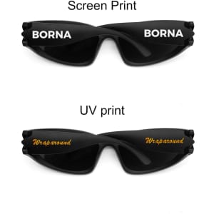 Wraparound sunglasses in black featuring two different print styles on the arms, one in white and one in gold.