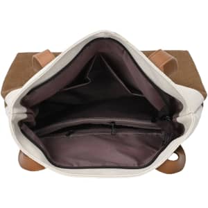 An interior view of a convertible canvas backpack to tote bag, featuring light fabric with dark brown compartments and leather straps.