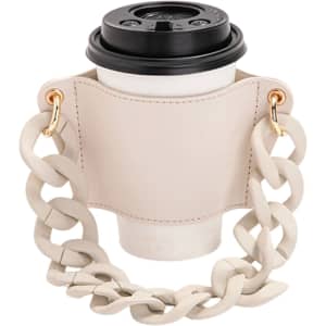 A drink bottle holder in beige leather with an acrylic strap, featuring gold-tone hardware and a cup included.