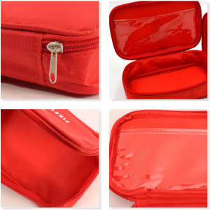 A red first aid kit bag with a zip closure and transparent compartments, featuring a logo.