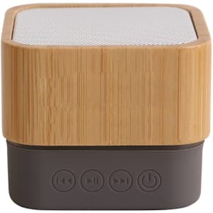 A bamboo Bluetooth wireless speaker featuring a textured wooden exterior and a dark control base.