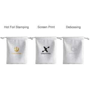 Three white PU leather drawstring gift bags, each featuring different logo printing styles: hot foil stamping, screen print, and debossing.