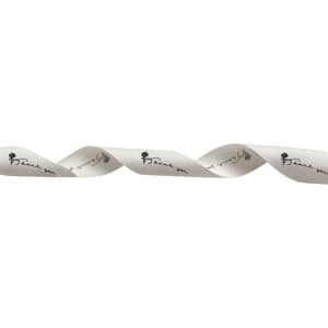 A spool of cream cotton ribbon with a printed black design running along its length. It has a branding logo.
