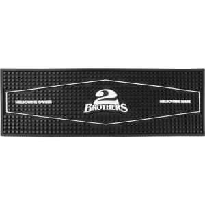 A black moulded PVC bar runner with textured surface and a logo in the centre.