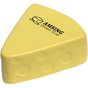 A yellow cheese-shaped stress reliever with a textured surface and a logo on its side.